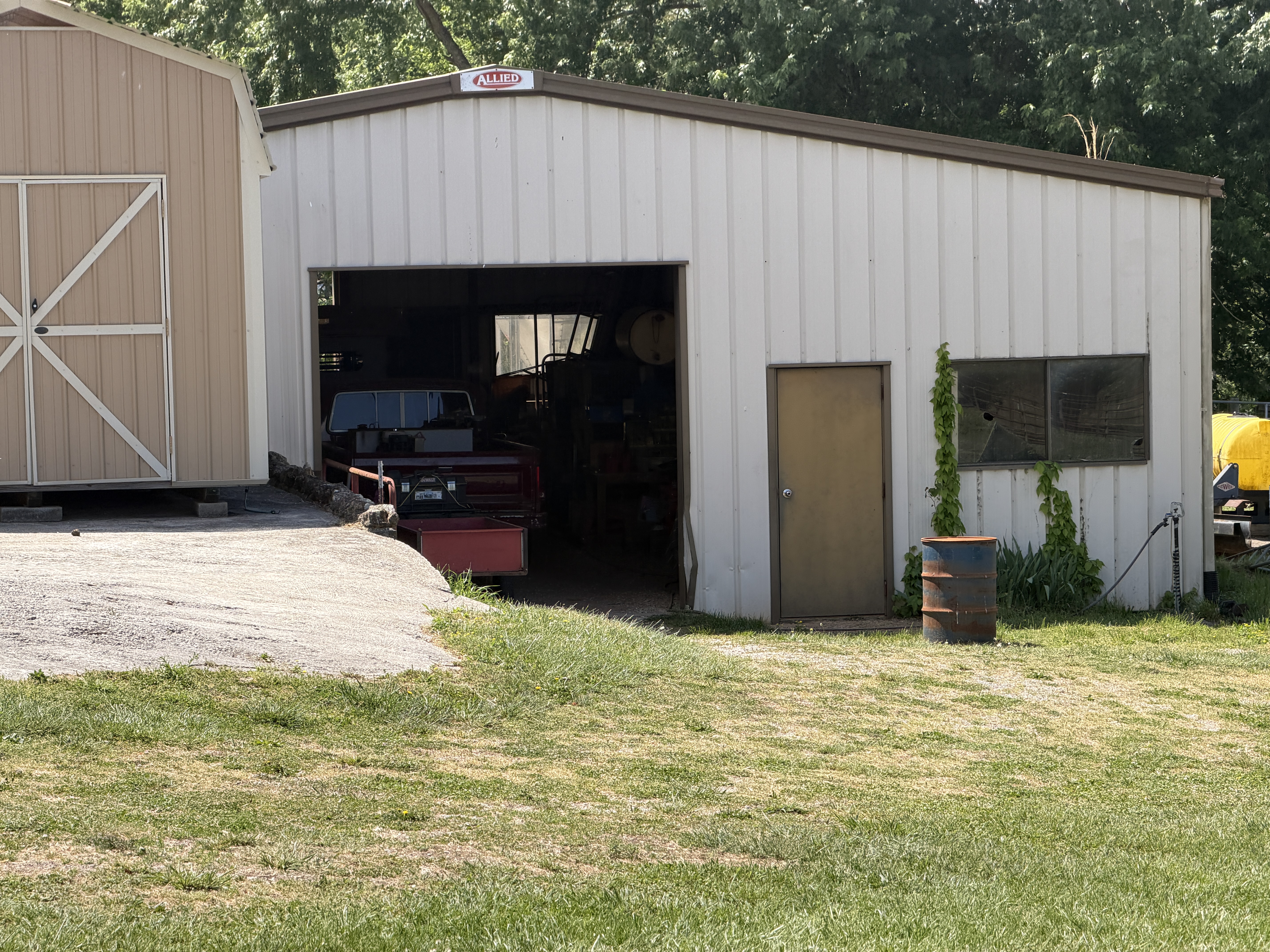 Large metal equipment barn in good condition